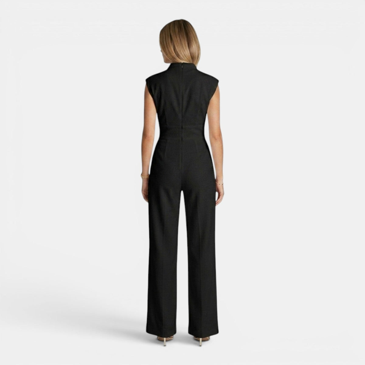 Tuta intera donna elegante con scollo a V e drappeggio fluido