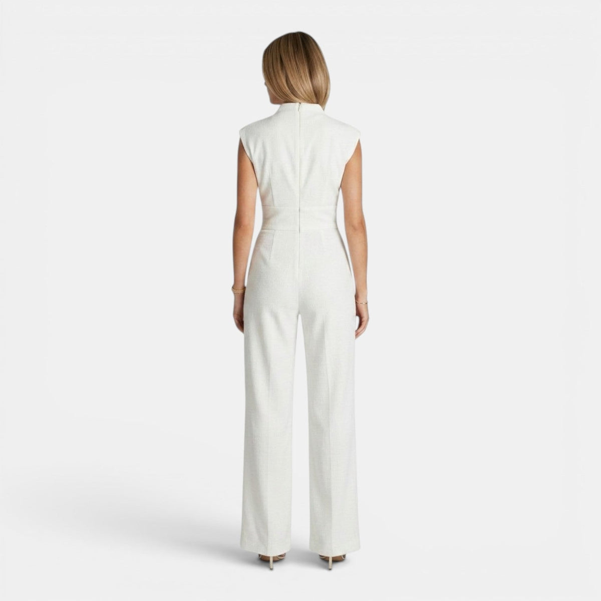 Tuta intera donna elegante con scollo a V e drappeggio fluido