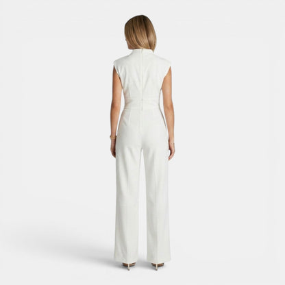 Tuta intera donna elegante con scollo a V e drappeggio fluido